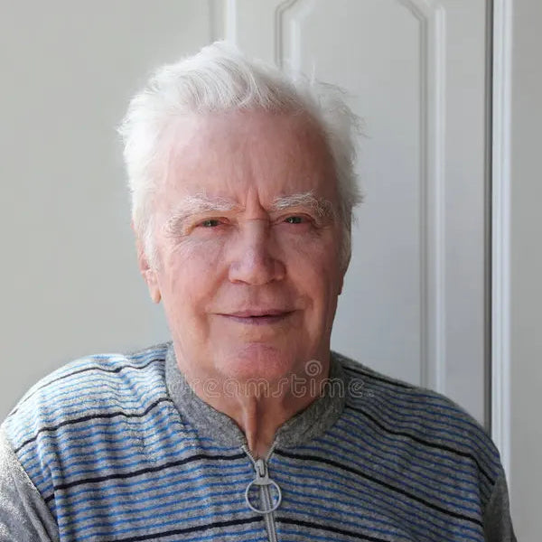 files/82-year-old-smiling-man-25318847.webp